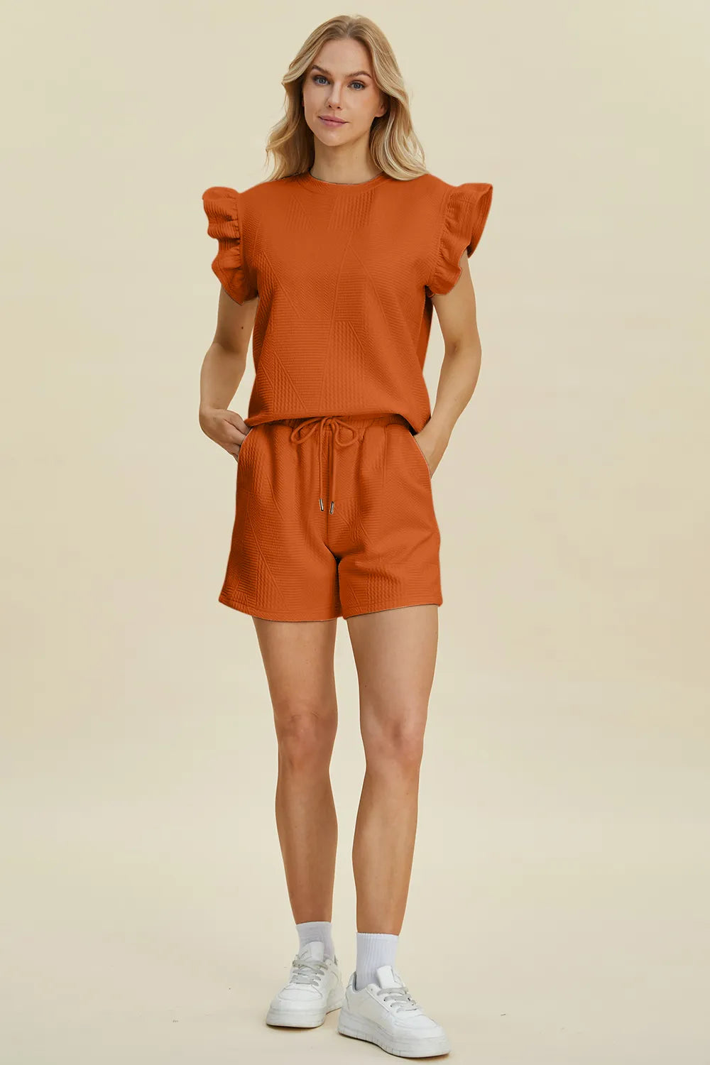 09741d91-331b-4247-8a70-319c0ca4f577-Max.jpg Double Take Full Size Texture Round Neck Ruffle Sleeve Top and Shorts Set - Image 23