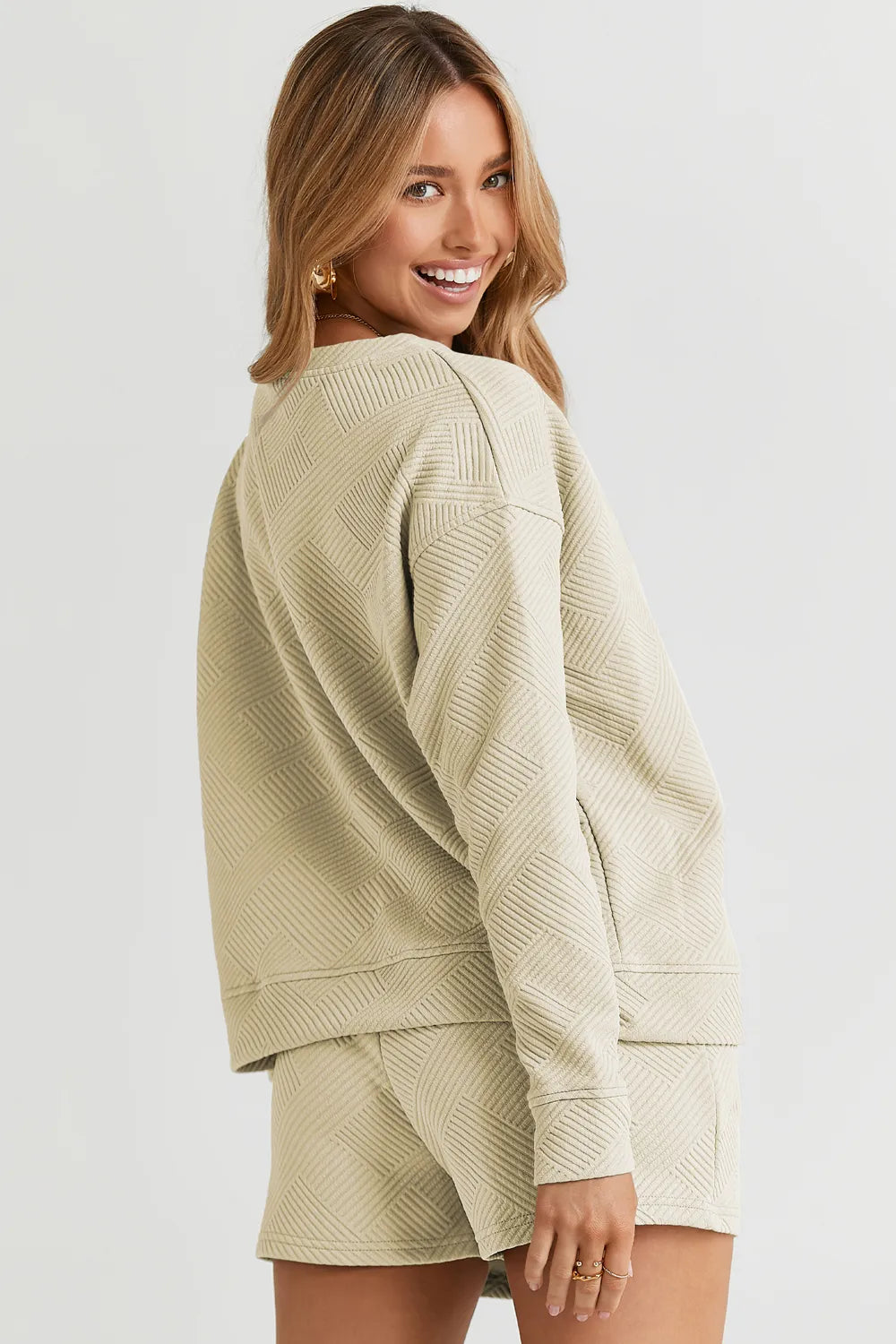 24d15d8331c0443e86dfe2a08e458524-Max.jpg Double Take Full Size Texture Long Sleeve Top and Drawstring Shorts Set - Image 31