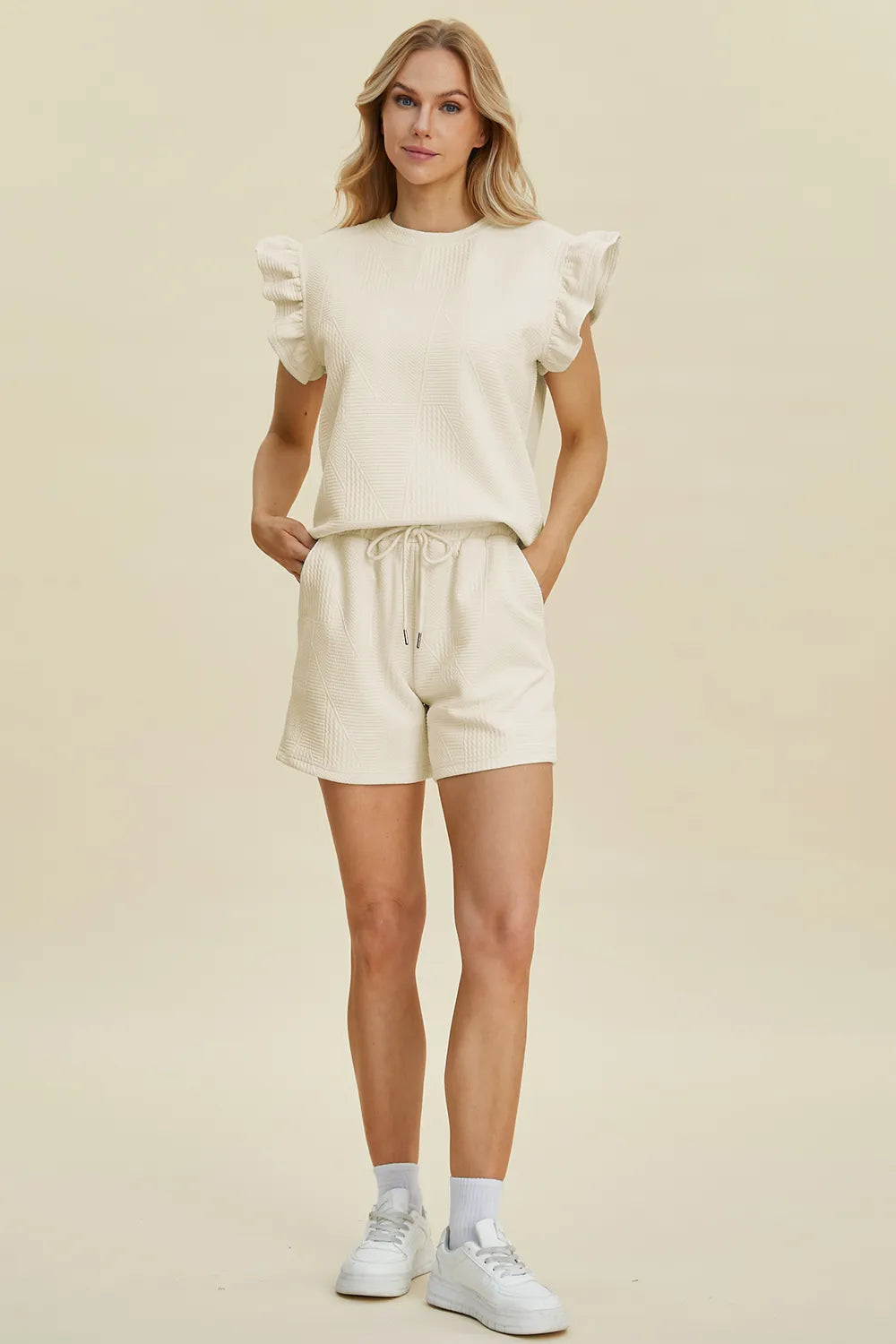 2b7cbaca-447d-484d-8d14-bd58433ab9a4-Max.jpg Double Take Full Size Texture Round Neck Ruffle Sleeve Top and Shorts Set - Image 9