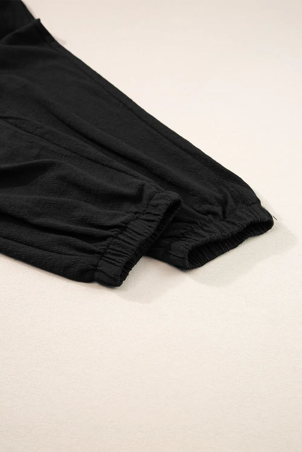2e2dc3dd-aaf0-49ff-8e8b-e2e34a8f2b1a-Max.jpg Smocked Sleeveless V Neck Jumpsuit - Image 9