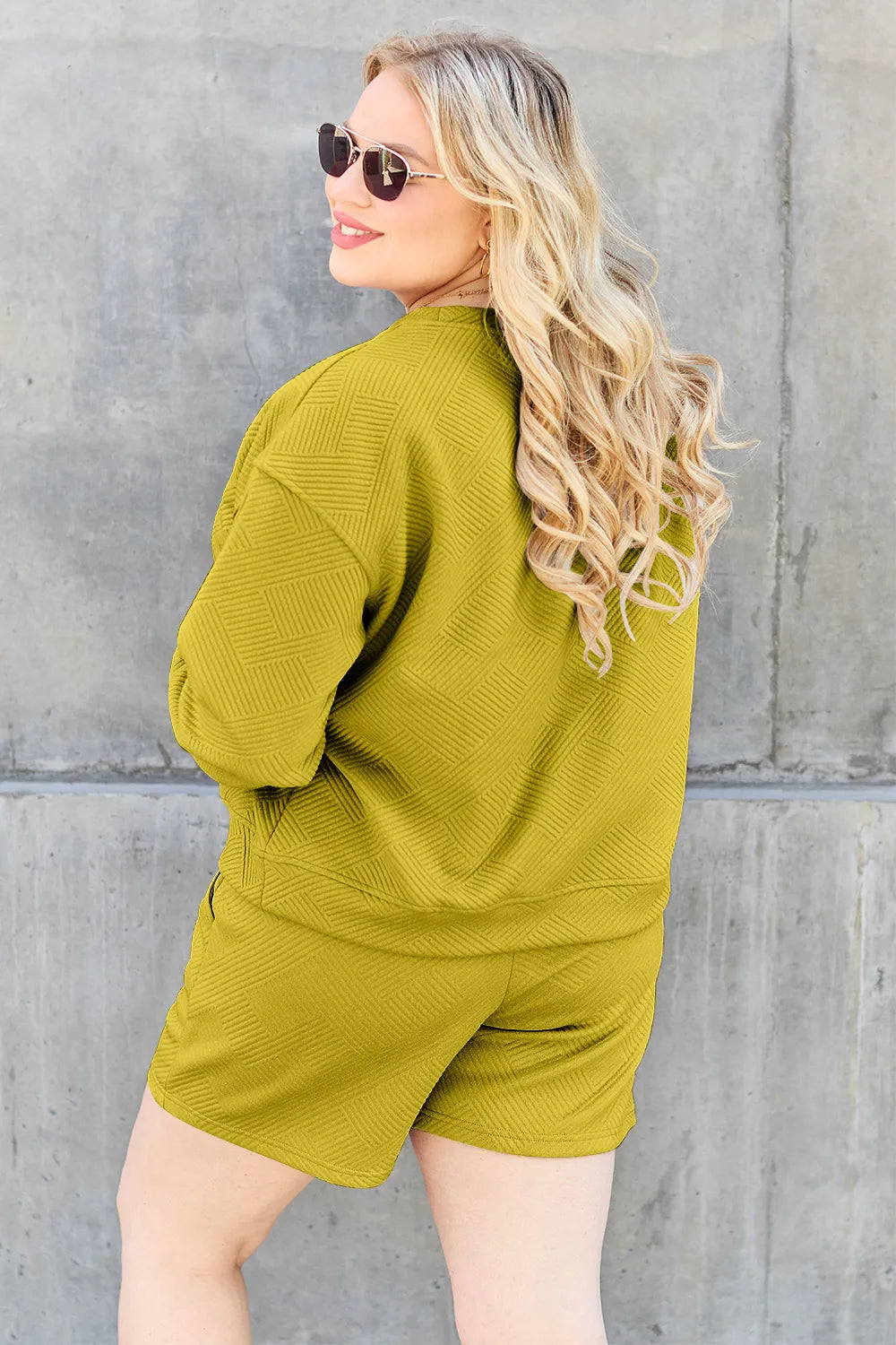 2fe04438-711b-4ee6-bec8-6bdd74b45655-Max.jpg Double Take Full Size Texture Long Sleeve Top and Drawstring Shorts Set - Image 27