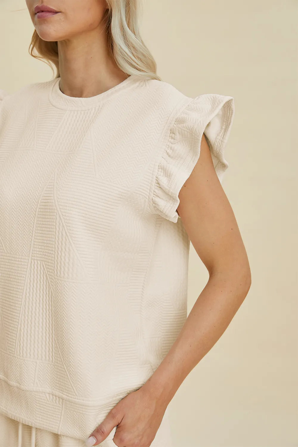 5cf52705-eaff-43d0-b19f-1769c23259c4-Max.jpg Double Take Full Size Texture Round Neck Ruffle Sleeve Top and Shorts Set - Image 11
