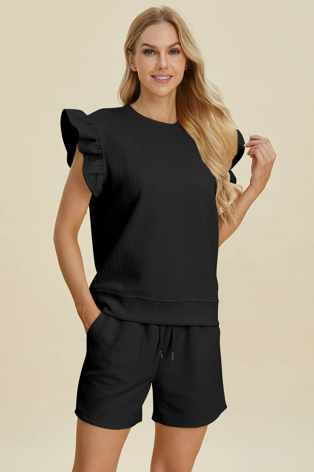 620fa91b-6023-4018-a0da-a6c4054f29b8-Max.jpg Double Take Full Size Texture Round Neck Ruffle Sleeve Top and Shorts Set - Image 18