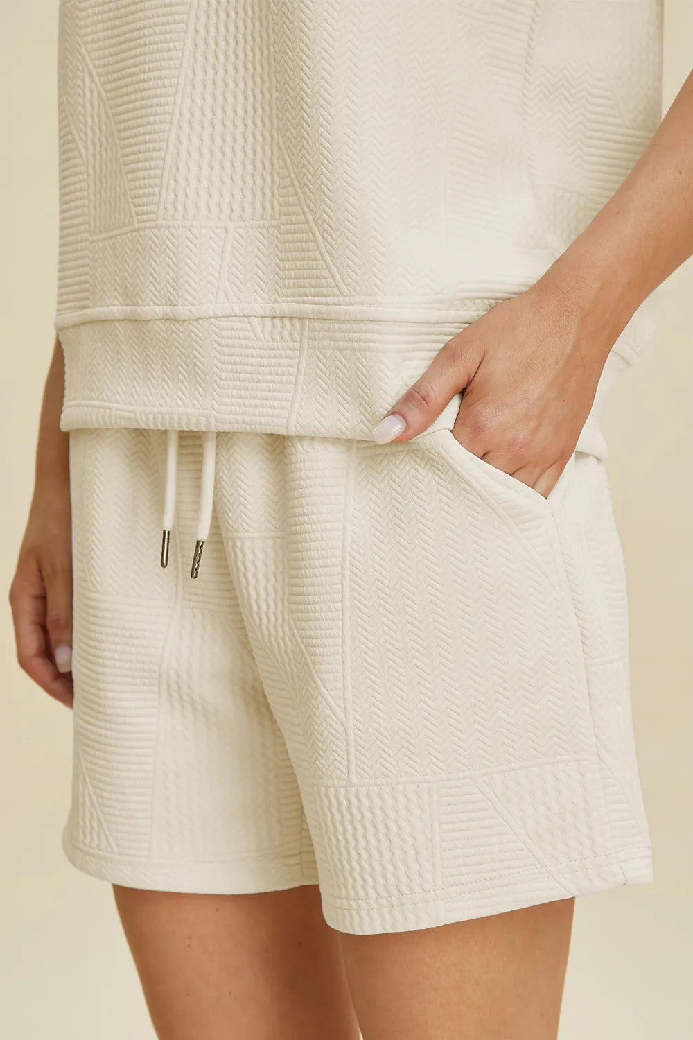 6a0caa06-a525-4954-8eaf-5e9a122a69a7-Max.jpg Double Take Full Size Texture Round Neck Ruffle Sleeve Top and Shorts Set - Image 10