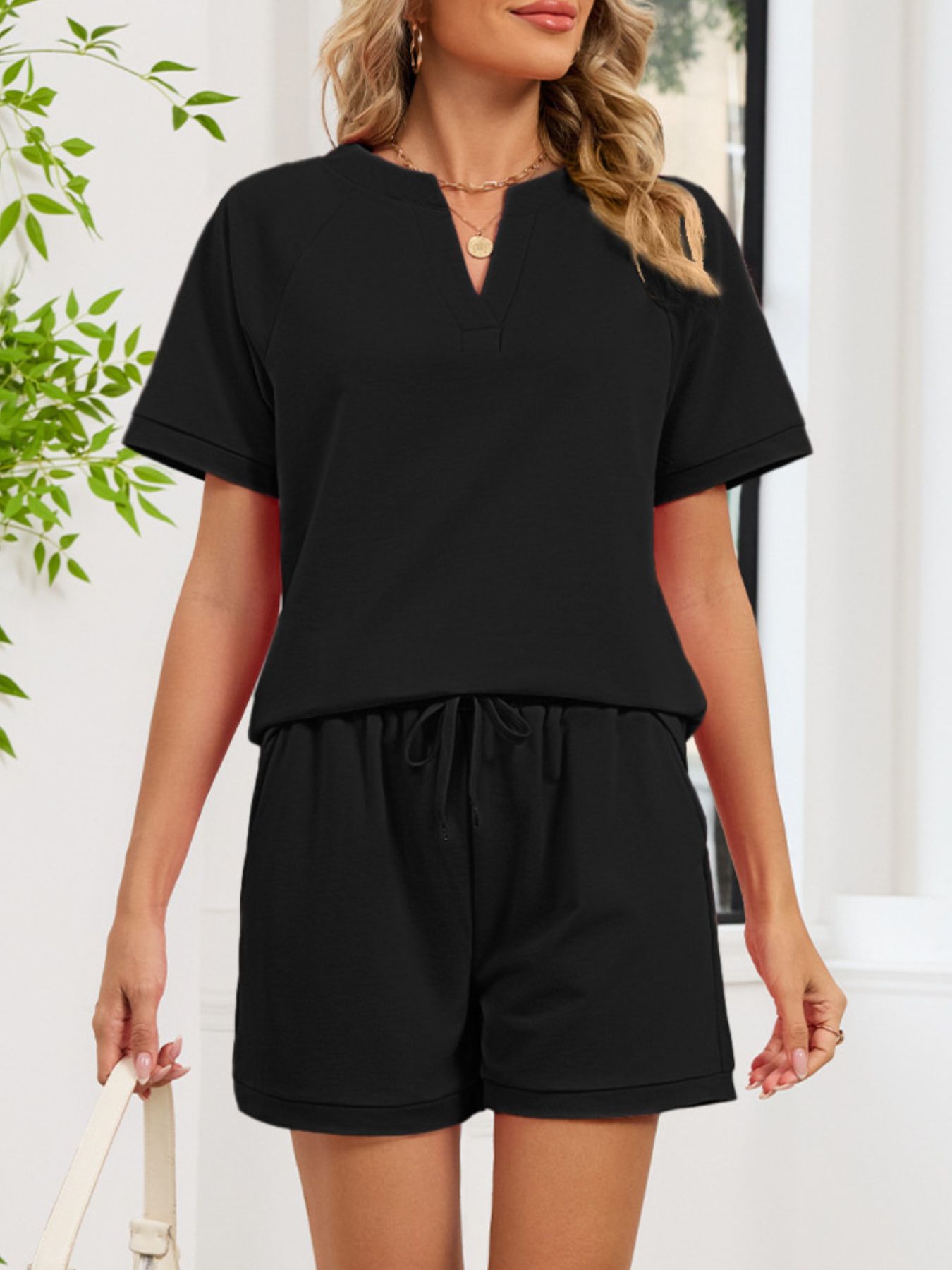7338b9bb-4399-494c-8a3c-e5b2938341c9-Max.jpg Notched Short Sleeve Top and Shorts Set - Image 17