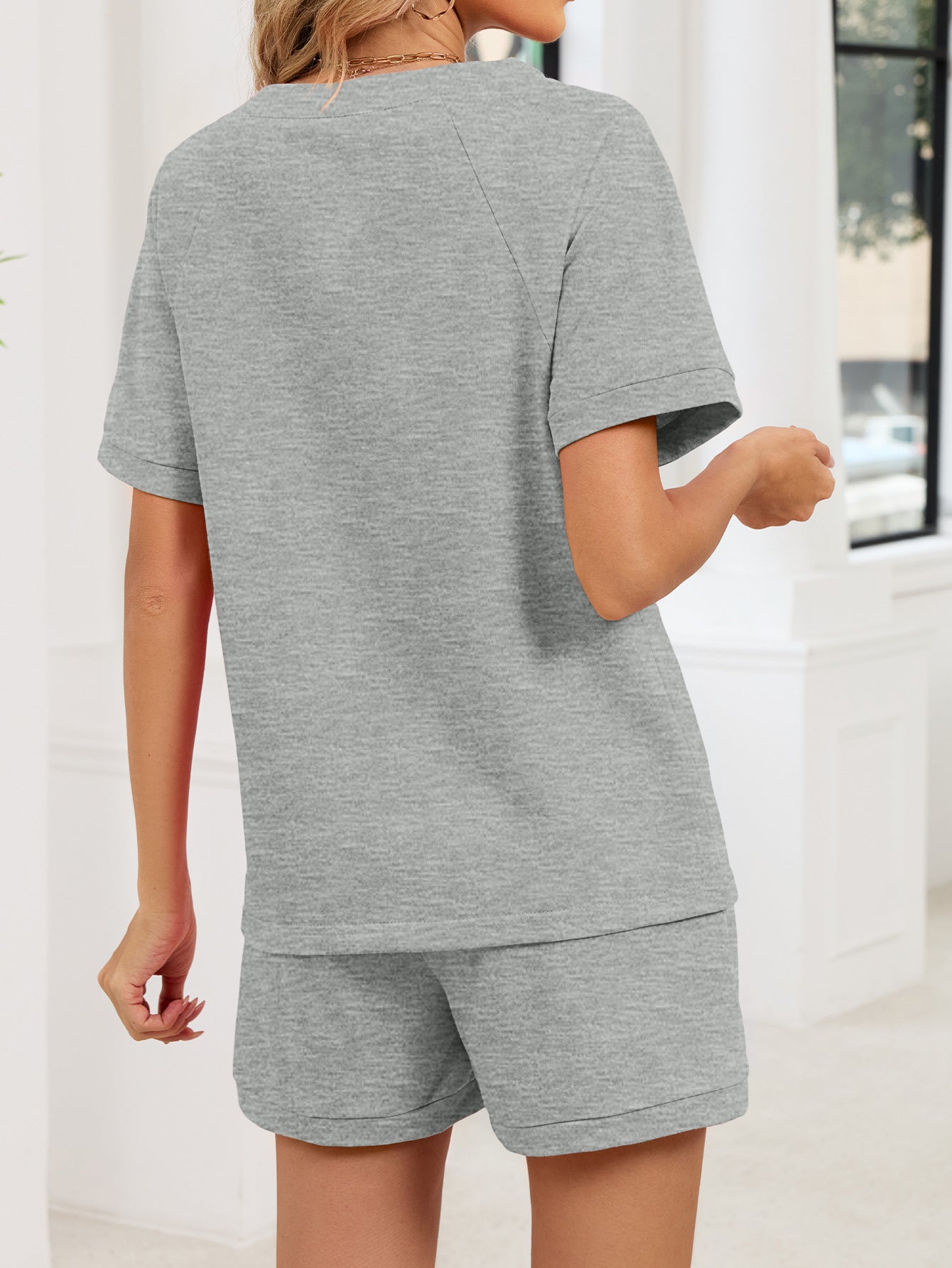 9f64a4e7-22c7-4e77-b18c-18350b72ea72-Max.jpg Notched Short Sleeve Top and Shorts Set - Image 12