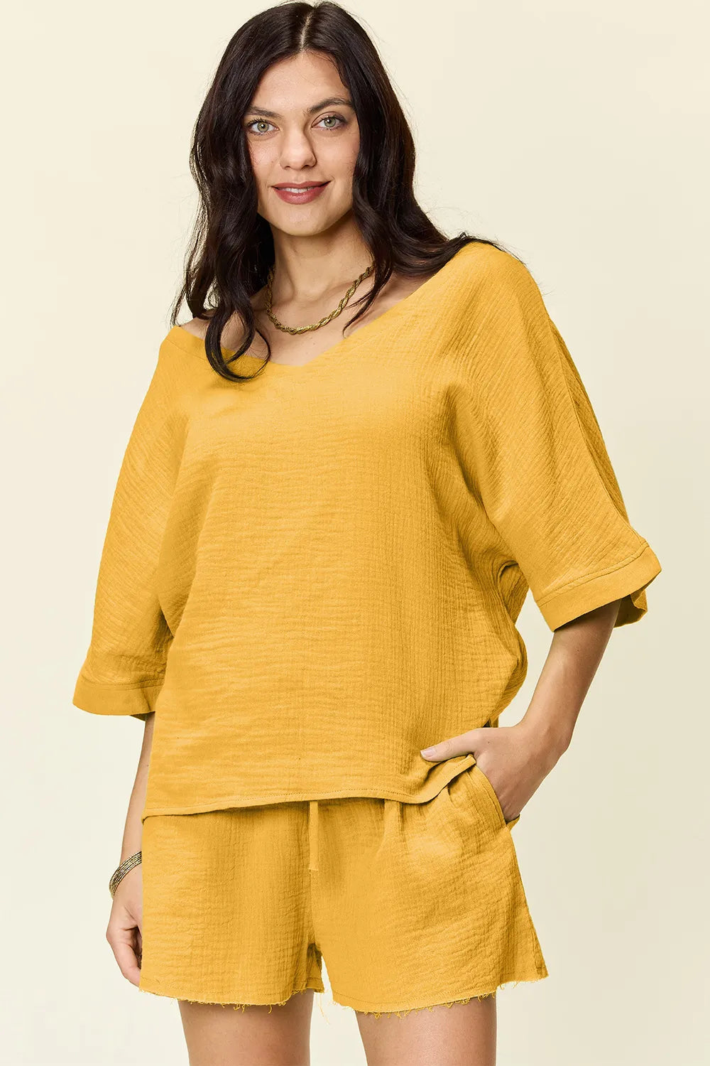 aa70b429-0cf4-4b50-98cf-1eb9593e66ea-Max.jpg Double Take Texture Half Sleeve T-Shirt and Drawstring Shorts Set