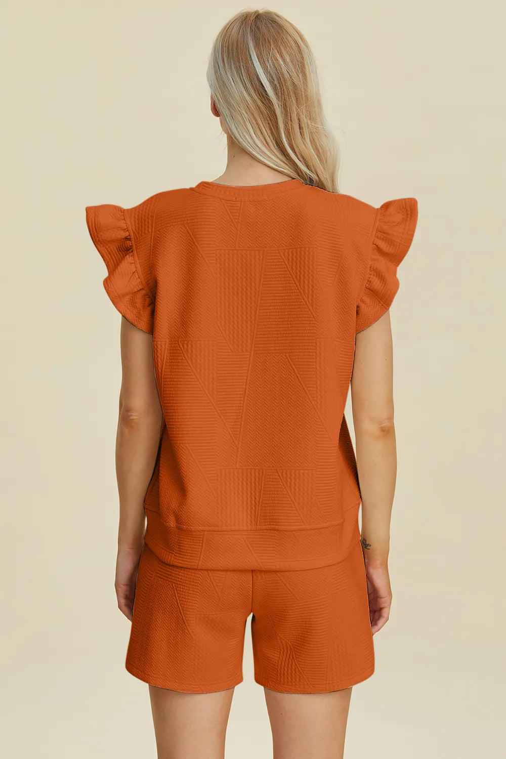 d663c3c4-296a-4da3-9831-9965364bc3ec-Max.jpg Double Take Full Size Texture Round Neck Ruffle Sleeve Top and Shorts Set - Image 21